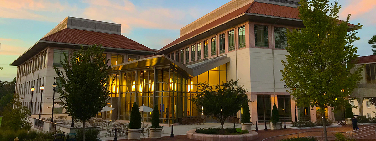 Rita Anne Rollins Building from the plaza side at sunset